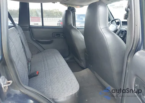 2000 Jeep Cherokee Sport из США, поврежденный, VIN 1J4FF48S7YL167840